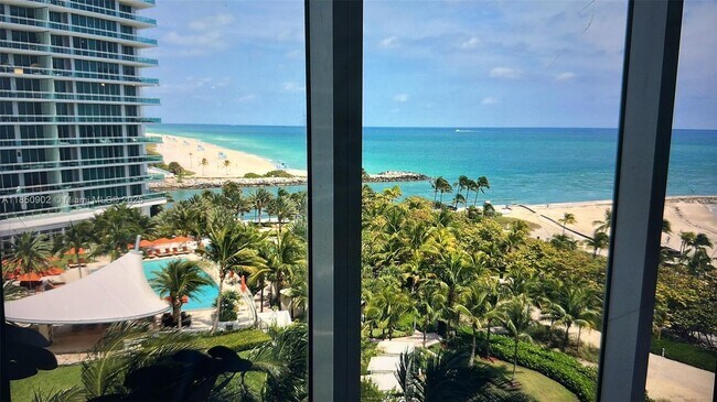 Building Photo - 10275 Collins Ave