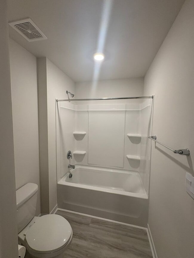 Building Photo - BRAND NEW TOWNHOME w/ Garage Parking