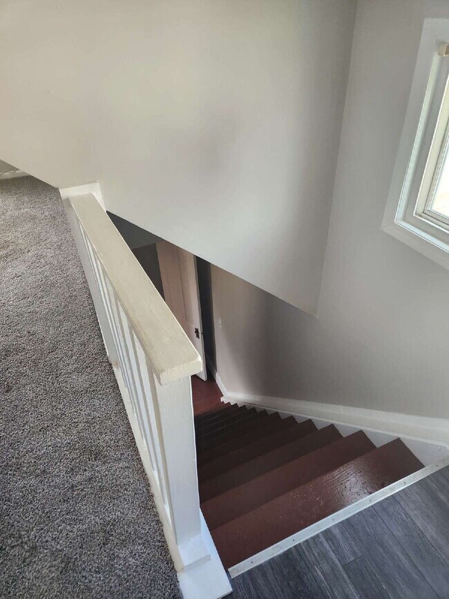 Building Photo - "Spacious 1.5 story 4-Bedroom Duplex on Ot...