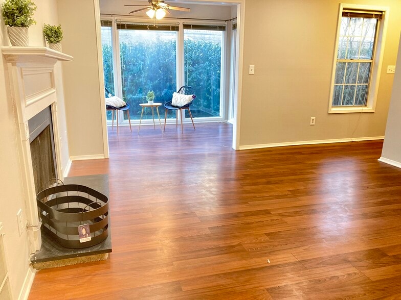 Living room with access to sun room - 1405 Vicksburg Plz