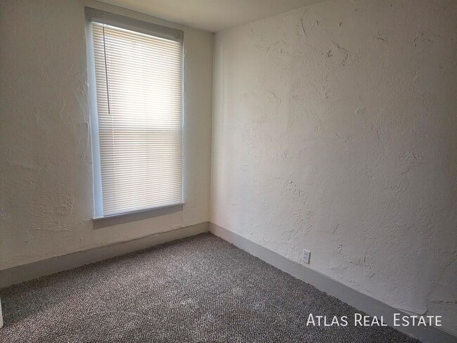 Building Photo - Take a Tour! Duplex Style Apartment! Avail...