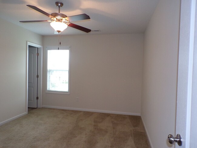 Building Photo - Two Bedroom Townhome located in the Burrou...