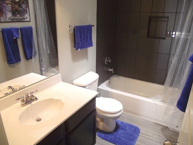 Building Photo - Sandstone Ranch Estates 4Bed/3Baths home with Refrig A/C and Synthetic Grass Yard!