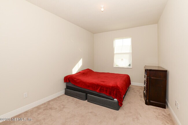 Building Photo - 10976 SW Tessili Wy