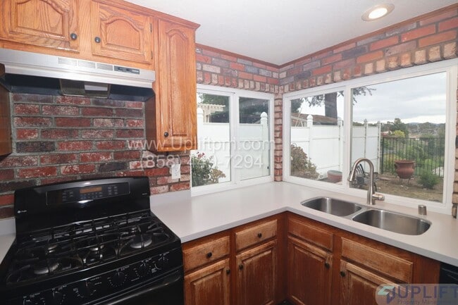 Building Photo - 4 Bed 3 Bath House in Spring Valley w/ Washer + Dryer and 2-Car Garage