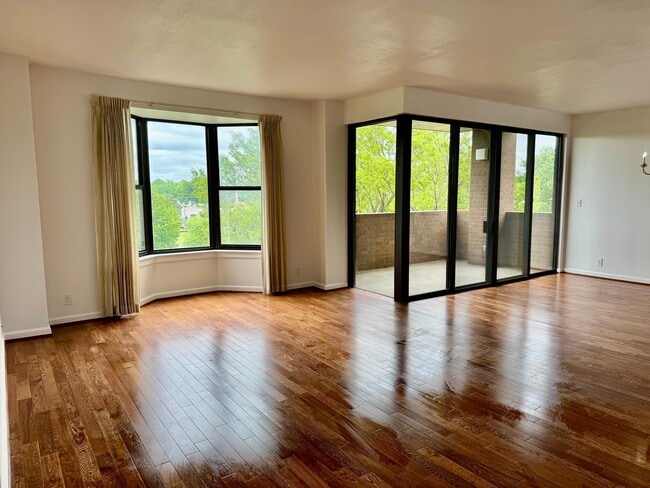 Building Photo - Experience Luxury and Prestige at Yorktown Condominiums