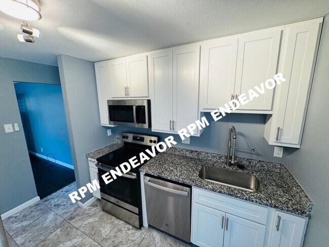 Primary Photo - "Charming 4-Bedroom Haven with Sunroom, Ha...