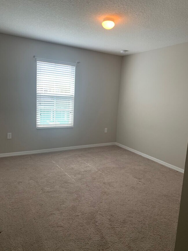 Building Photo - MOVE IN SPECIAL- 4/2.5 Energy Efficient Townhome in St. Cloud