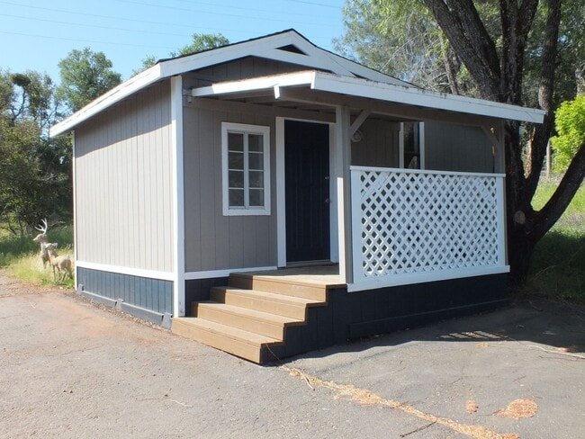 Building Photo - Rescue 4/3 retreat - includes separate cottage/office, 2 garage bays, RV pad and 5 acres with Sie...