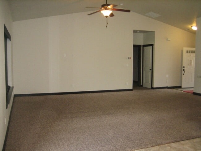 Building Photo - CDA Home w/ 22X45 RV Garage/Shop!