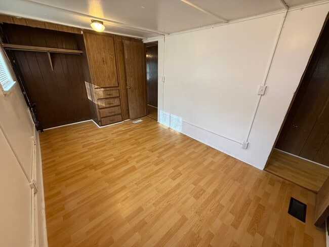 Building Photo - 2 Bedroom 1.5 Semi-Rural Mobile Home with Workshop on Large Lot