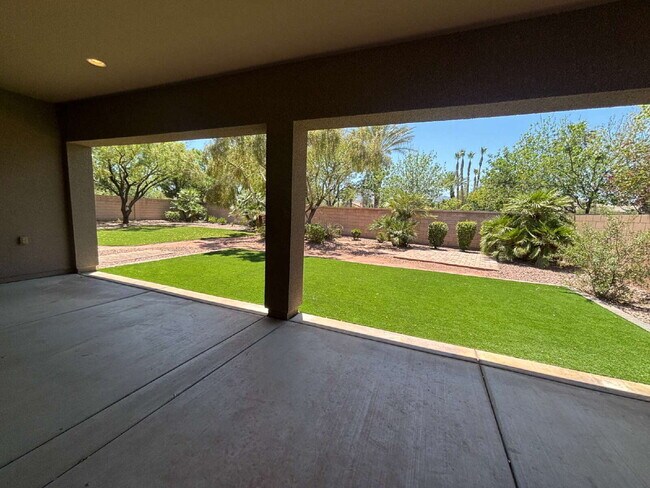 Building Photo - 5-Bed Retreat with Granite Elegance & Cozy Fireplace – 3690 Sq Ft of Comfort in Las Vegas with a ...