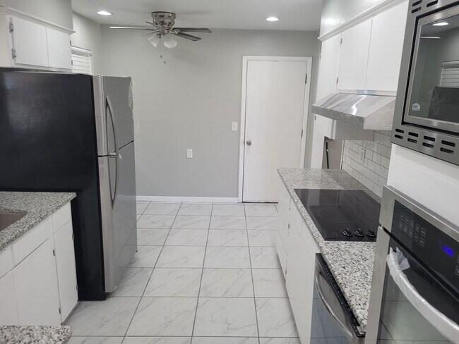 Building Photo - Remodeled 3 bedroom 2 bathroom house with 2 car garage and fenced yard