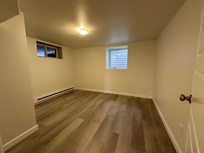 Bedroom 1: 10'4" x 11'5" bedroom - 1137 E Platte Ave