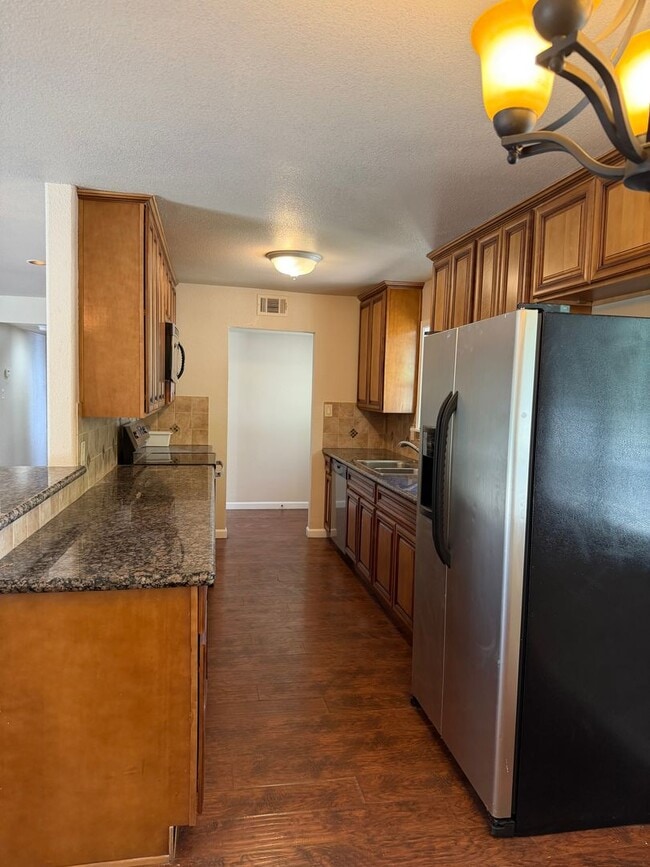 Building Photo - Beautifully Remodeled Single-Story Home with Huge Backyard & RV Access!