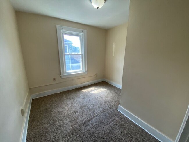 Building Photo - Warm & Bright West Akron 3BR with Fireplace, Off-Street Parking & Backyard