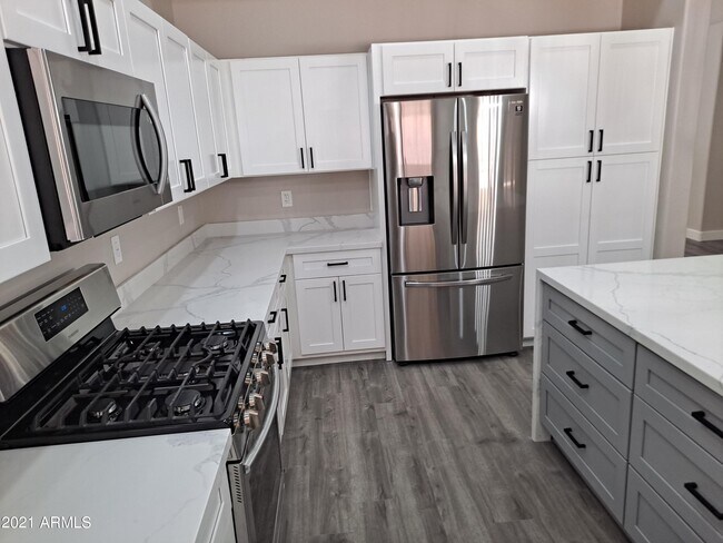 Building Photo - 9074 E Caribbean Ln