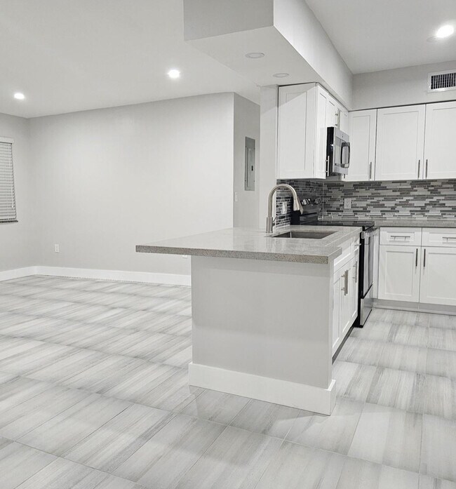 Building Photo - 1680 NW 128th St