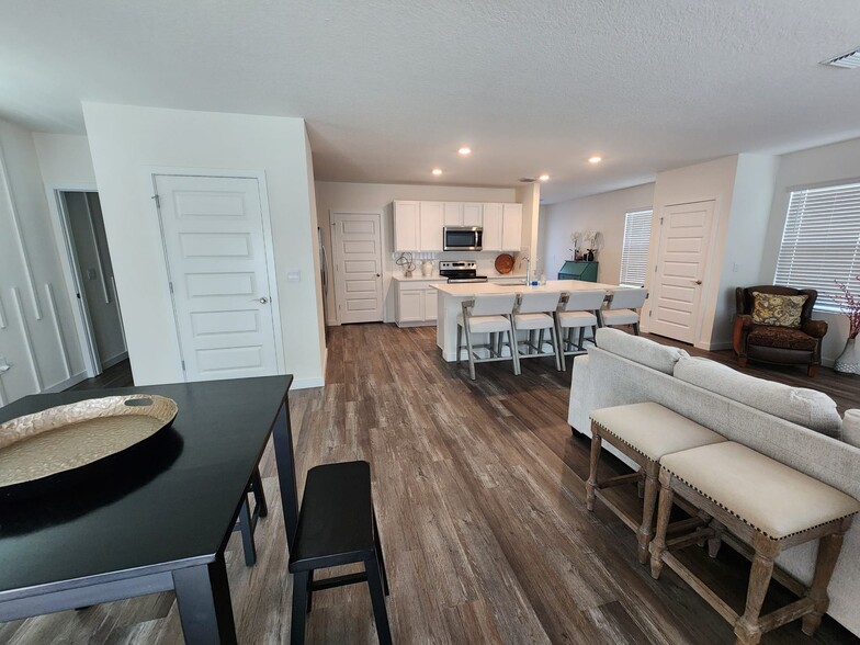 Downstairs Living Area and Kitchen - 17020 Barnwood Pl