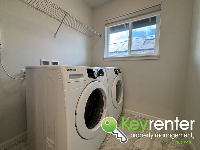 Building Photo - Stylish 4-Bedroom Home with Finished Basem...