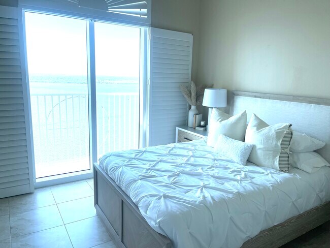 3rd bedroom with deck access and water views - 2745 1st St