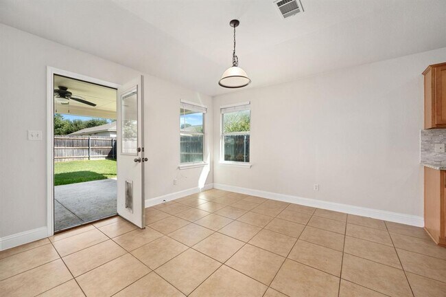 Building Photo - 7817 Squirrel Hollow Dr