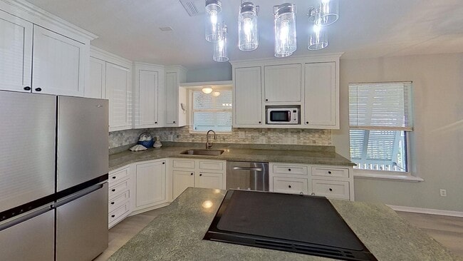 Building Photo - NO HOA! Wrap around porches, 1 block to the beach!