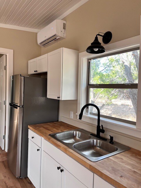 Window over sink for extra lighting and full-size refrigerator - 1565 Pump Station Rd