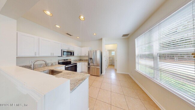 Building Photo - 8498 Climbing Ivy Trail S