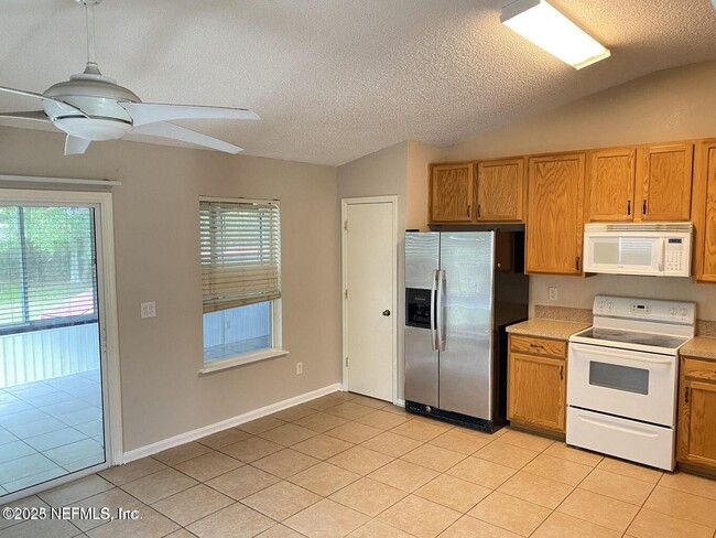 Building Photo - 5646 Chirping Way W