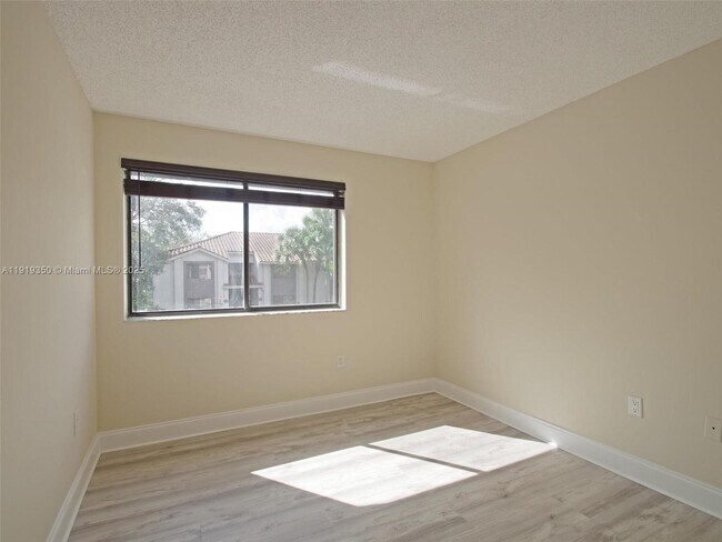 Building Photo - 8321 Coral Lake Dr