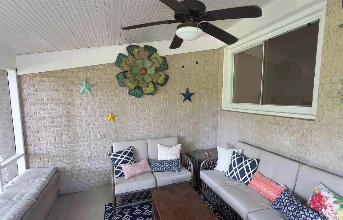 Covered porch for morning coffee or tea - 611 Ambrose Dr