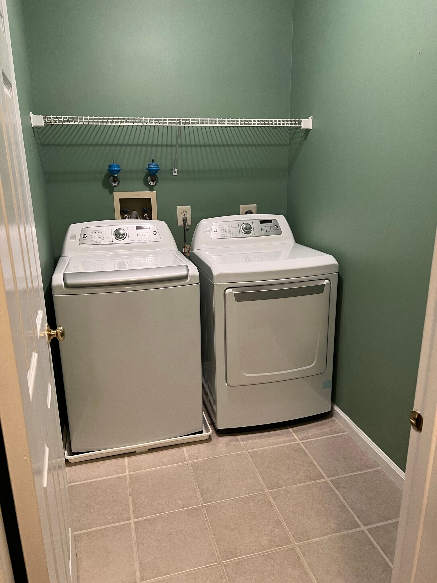 Laundry room at the top of the steps - 8804 Spruce Mill Dr