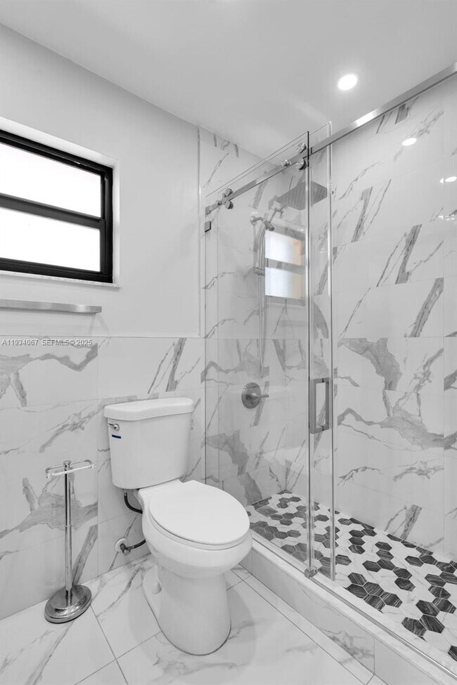 Building Photo - 5061 W 12th Ln