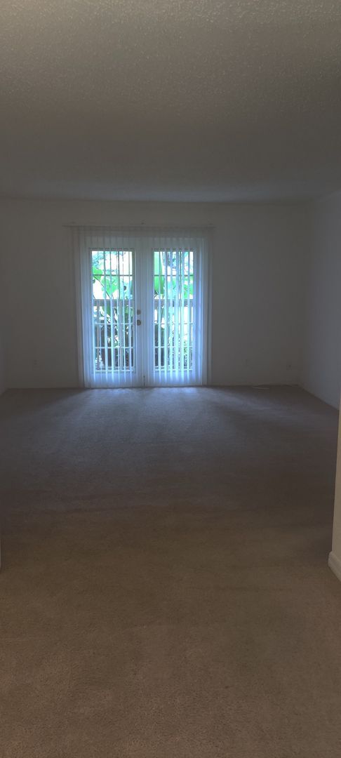 Building Photo - Ground Floor Two bedroom condo
