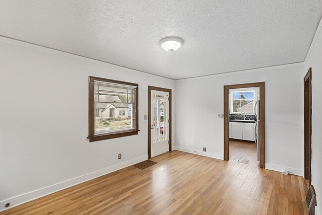 Building Photo - Charming Bungalow with Spacious Loft Suite and Large Backyard