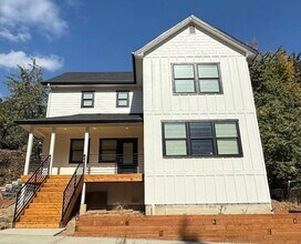 Building Photo - Beautiful brand new home in downtown Rosly...