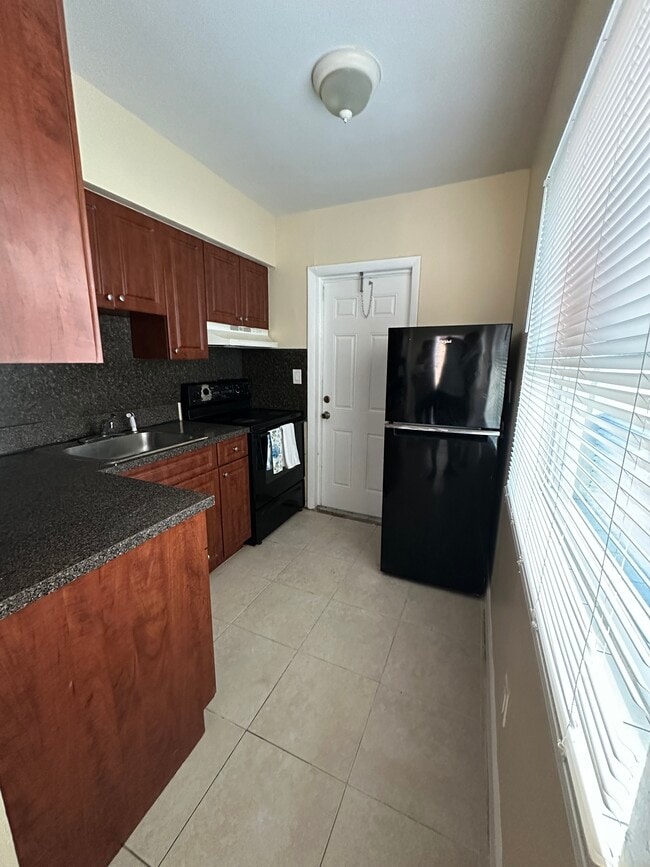 Building Photo - 240-260 NW 40th Ct