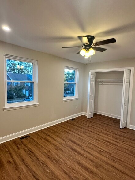 Oversized sunlit bedroom with expansive walk-in closets - 55 Providence Ave