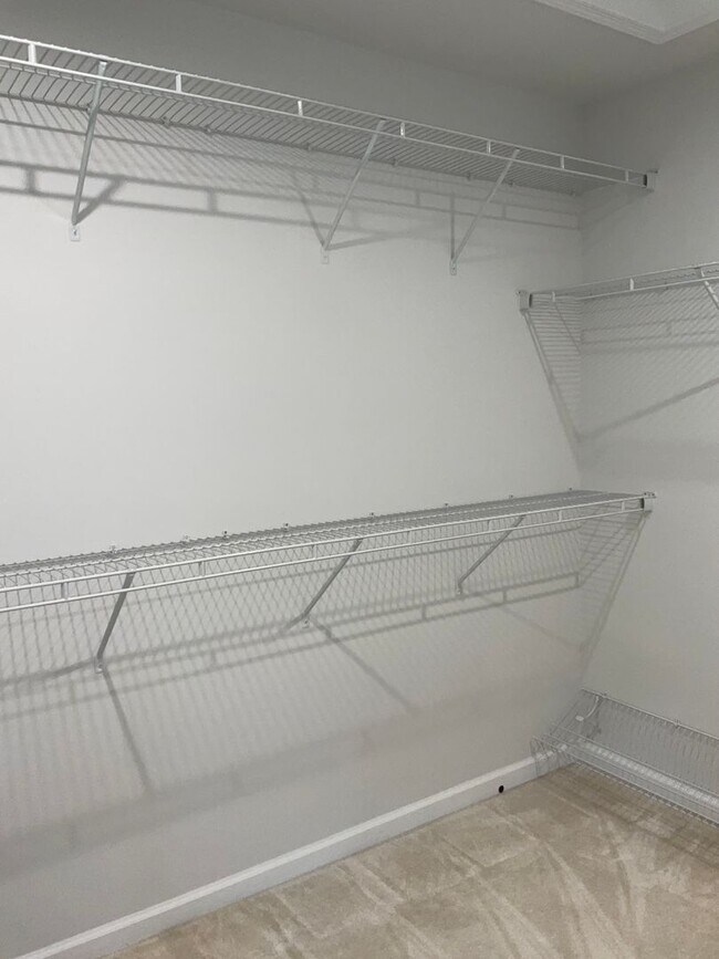 Building Photo - Beautiful 4BR 3.5BA 3 level townhome with 2 car attached garage located in the Cabin Branch Commu...