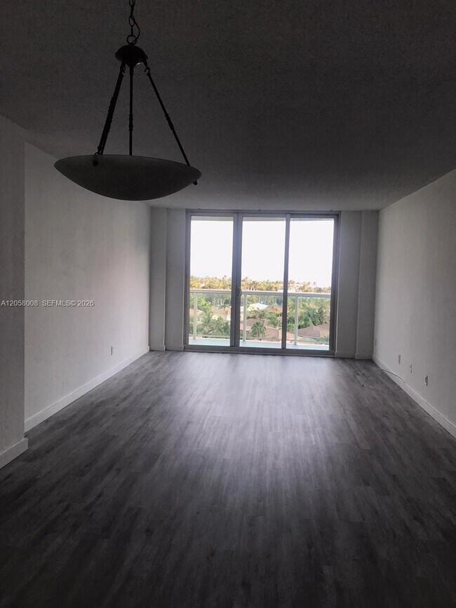 Building Photo - 19380 Collins Ave