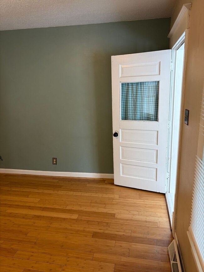 Building Photo - Charming 2-Bedroom, 1.5-Bath with Garage & Fenced Yard