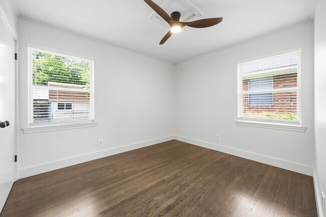Building Photo - **$40K+ IN UPGRADES AND A FENCED BACKYARD WITH TWO STORAGE BUILDINGS**
