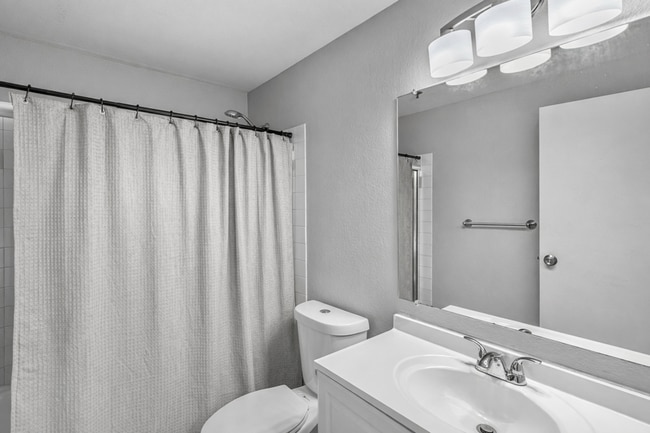 Building Photo - 2BR Condo w/ Vaulted Ceilings, W/D, Parking & Amenities