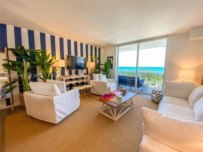 Building Photo - 10275 Collins Ave