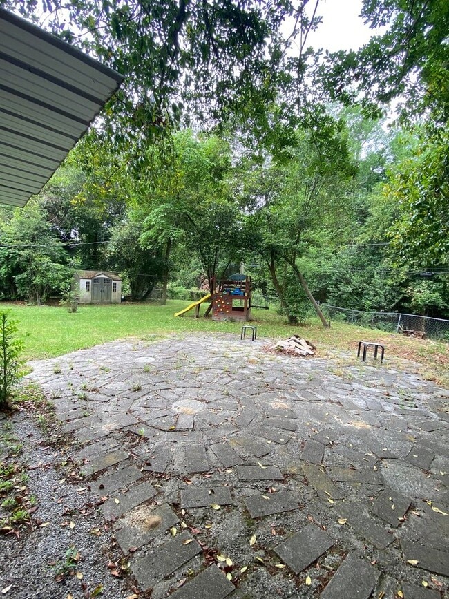 Building Photo - Spacious 3BR/2BA with Open Layout and Large Backyard