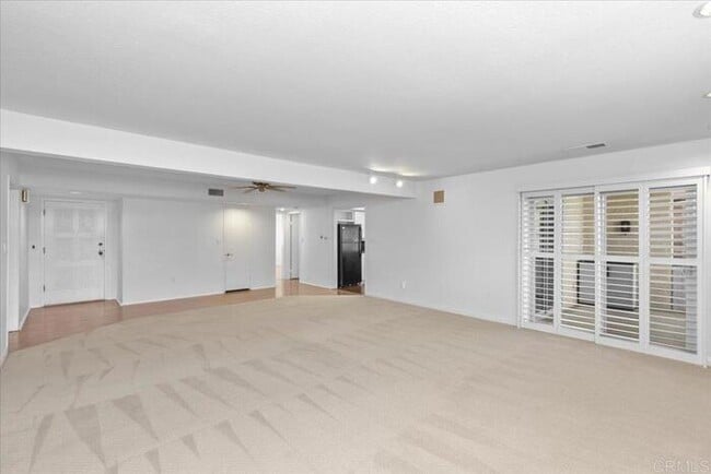 Building Photo - Poolside Living at Its Finest – Turnkey 3BR Condo with Direct Patio Access to the Pool