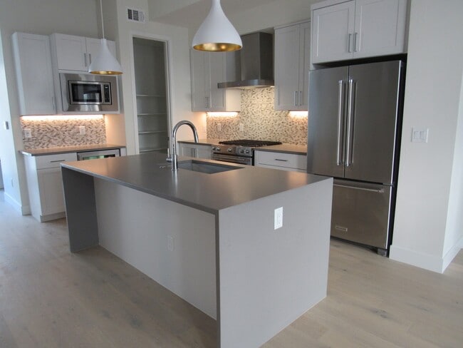 Building Photo - Town home a Block away from Sloan's Lake with roof top Deck