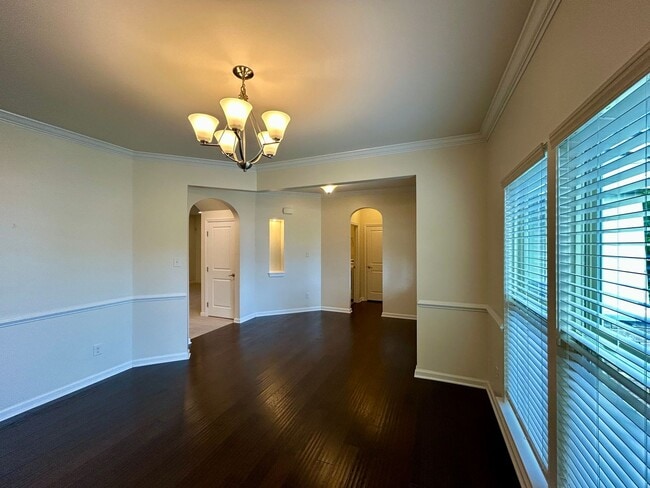 Building Photo - Captivating Craftsman style residence, nestled in the serene Wynwood Section of Fox Creek Subdivi...