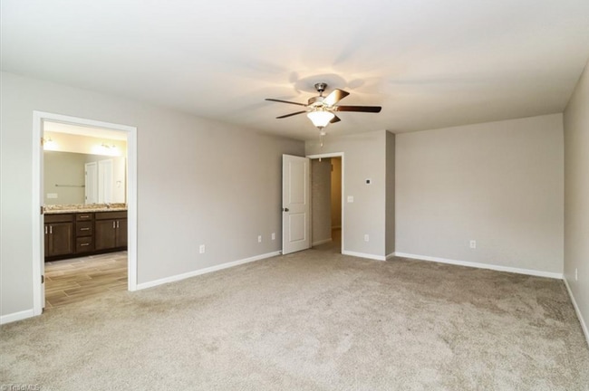 Building Photo - Impeccable maintenance-free 2 level 4 bedr...